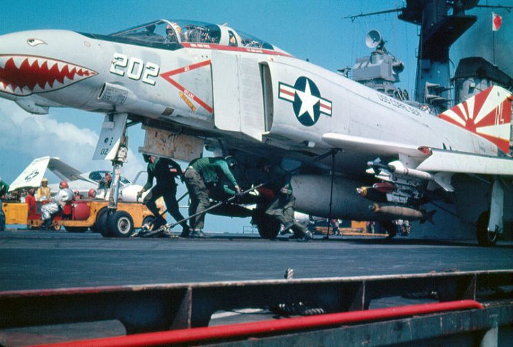 McDonnellDouglas F-4B Phantom II of fighter squadron VF-111 Sundowners about to be launched from the aircraft carrier USS Coral Sea during a deployment to Vietnam in 1971/2.It’s armed with AIM-9D Sidewinder missiles and Mk 82 (500 lb/227 kg) bombs. The relatively small weapons load was typical for Coral Sea due to the limited catapult capacity.