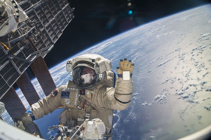 Russian cosmonaut Sergey Ryazanskiy, Expedition 37 flight engineer, attired in a Russian Orlan spacesuit, is pictured during a session of extravehicular activity (EVA) in support of assembly and maintenance on the International Space Station