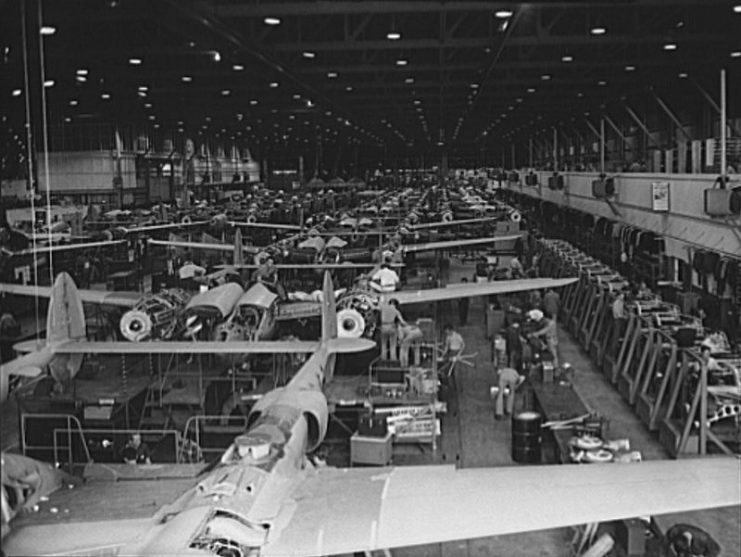 P-38 Lightning assembly line at the Lockheed plant, Burbank, California in World War II. In June 1943, this assembly line was reconfigured into a mechanized line, which more than doubled the rate of production