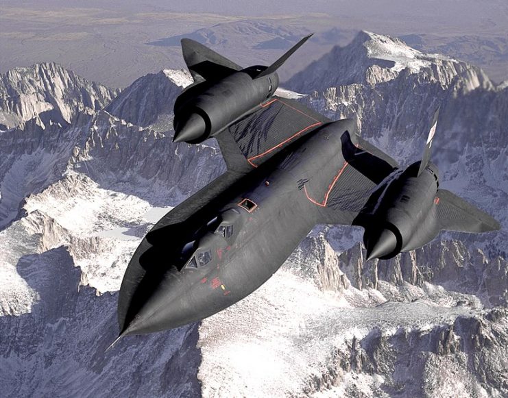 Dryden’s SR-71B Blackbird, NASA 831, slices across the snow-covered southern Sierra Nevada Mountains of California after being refueled by an Air Force tanker during a 1994 flight. SR-71B was the trainer version of the SR-71. The dual cockpit was to allow the instructor to fly.
