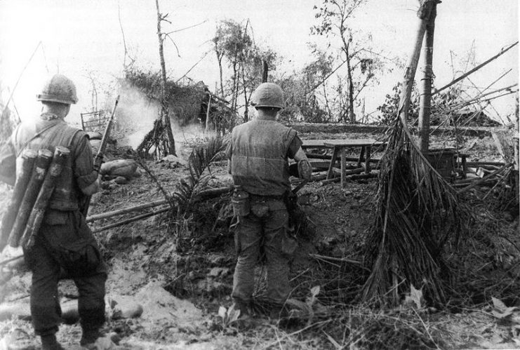 U.S. Marines move through the ruins of the hamlet of Dai Do after several days of intense fighting during the Tet Offensive Vietnam