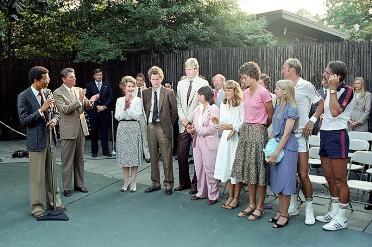 President Reagan and Nancy Reagan during a reception for the American Davis Cup and Wightman Cup Teams at the White House Tennis Court with  Arthur Ashe: 14 September 1981