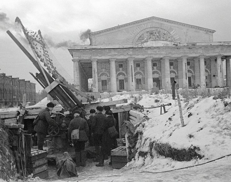 Antiaircraft-gunners firing at the enemy in besieged Leningrad.