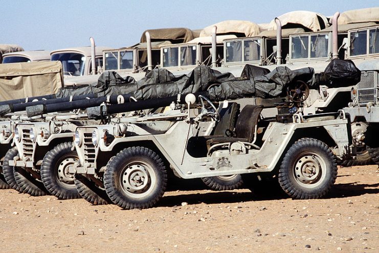Saudi Arabian M-151A2 light utility vehicles with recoilless rifles stand in a holding area during Operation Desert Shield.