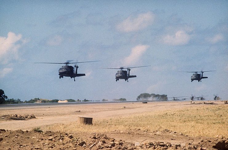 UH-60A Black Hawk helicopters over Point Salines. The conflict saw the first use of the UH-60 Blackhawk.