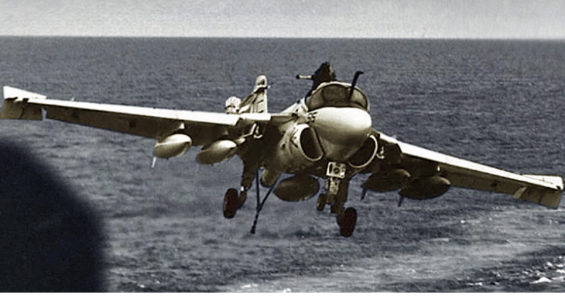 The A-6 Landing on the USS Abraham Lincoln. Notice the navigator stuck above the cockpit.