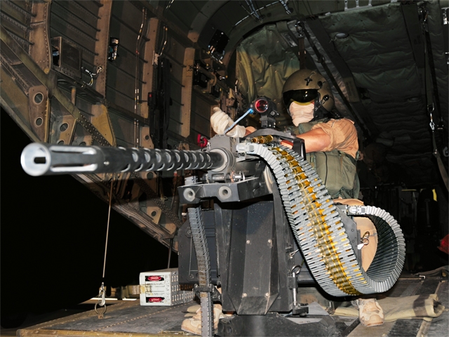 A German Army rampgunner mans an M3M onboard a CH-53GS helicopter.