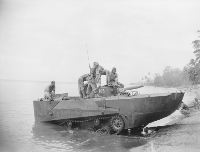A Japanese Type 2 Ka-Mi Amphibious Tank coming ashore after trials carried out by members of 2 4 Armoured Regiment in Talili Bay, Rabaul, New Britain.