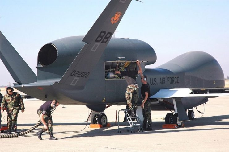 A maintenance crew preparing a Global Hawk at Beale Air Force Base