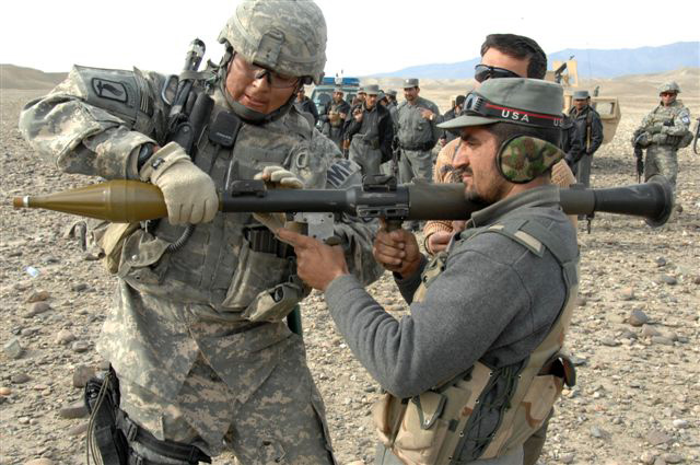 Afghan National Police officer ready to fire an RPG round at a training site.