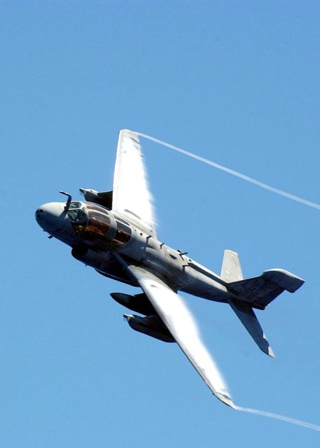 An EA-6B Prowler from VAQ-138 carrying two wing mounted jamming pods.