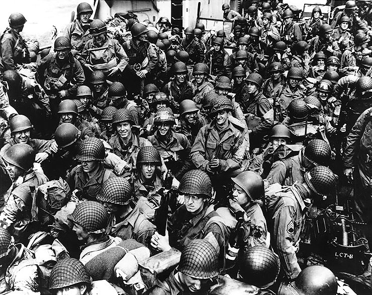 American troops on board a LCT, ready to ride across the English Channel to France. 12 June 1944.