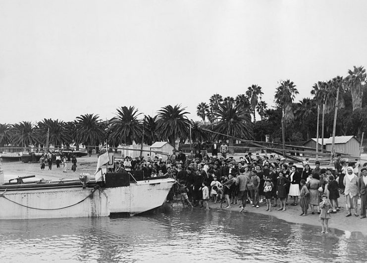 Arzew inhabitants meet U.S. Army Rangers in November 1942 during Allied Operation Torch.