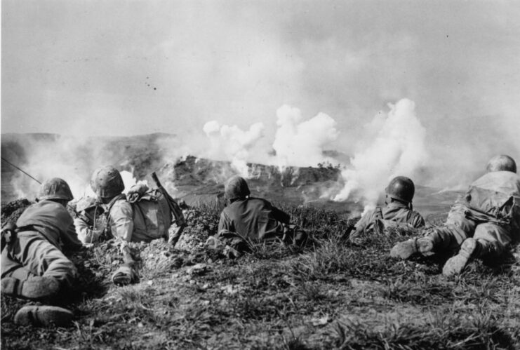 Five US Marines lying on the ground to avoid a phosphorous attack on Okinawa