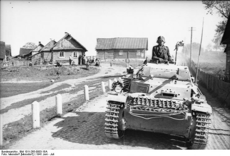 Soviet Union. “Operation Barbarossa”, Panzer II on a street outside a village. By Bundesarchiv Bild CC BY-SA 3.0 de