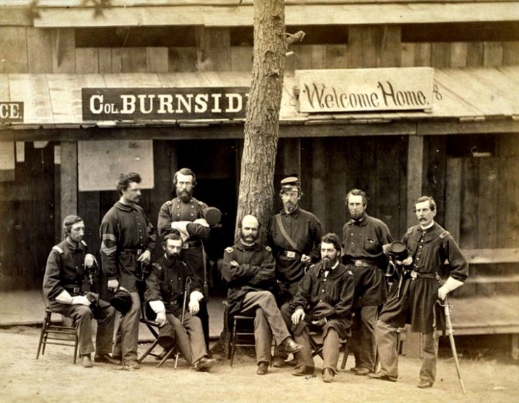 Rodman (leaning against tree) with Col. Ambrose E. Burnside and officers of the 1st Rhode Island
