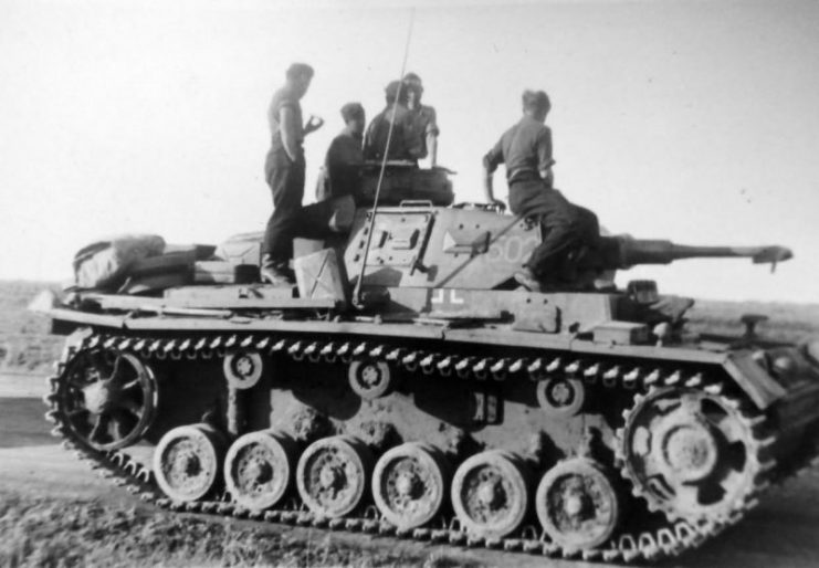 Crew atop a Panzerkampfwagen III 502