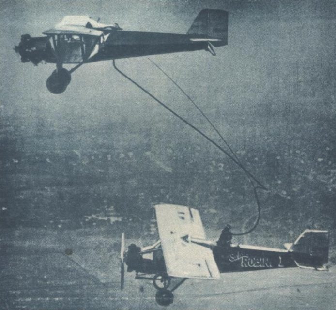 The aircraft Curtiss Robin “St. Louis” (right) during a record endurance flight 13-30 July 1929, at St. Louis, Missouri, flown by Dale Jackson and Forest O’Brine for 17 days, 12 hours, 17 minutes