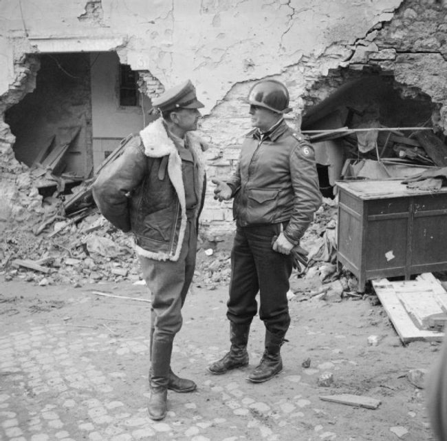 General Sir Harold R. L. G. Alexander, Commander-in-Chief (C-in-C) of the Allied Armies in Italy (AAI), with Major General Lucian K. Truscott Jr., commander of the U.S. VI Corps, in the Anzio beachhead, Italy, 4 March 1944.