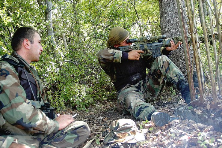 A Georgian sniper takes aim at Ossetian rebels. By Jonathan Alpeyrie CC BY-SA 3.0