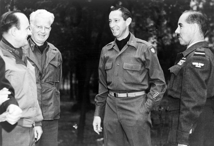 From left to right, Alfred Gruenther, Donald W. Brann, Mark W. Clark, and Guy Garrod.