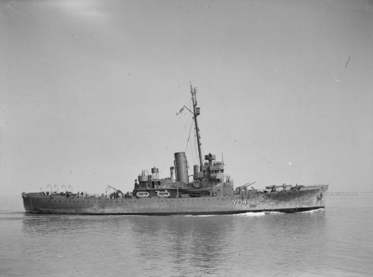 HMS WALNEY, formerly USS SEBAGO, after refit. Underway in coastal waters.