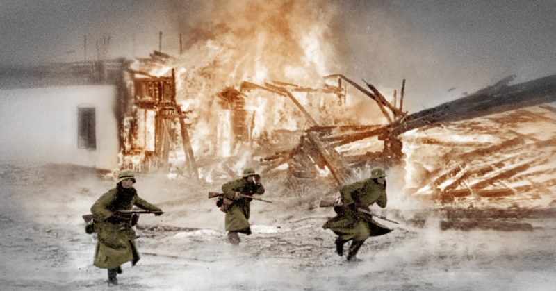 German infantry attacking through a burning Norwegian village. By Bundesarchiv Bild CC-BY-SA 3.0
