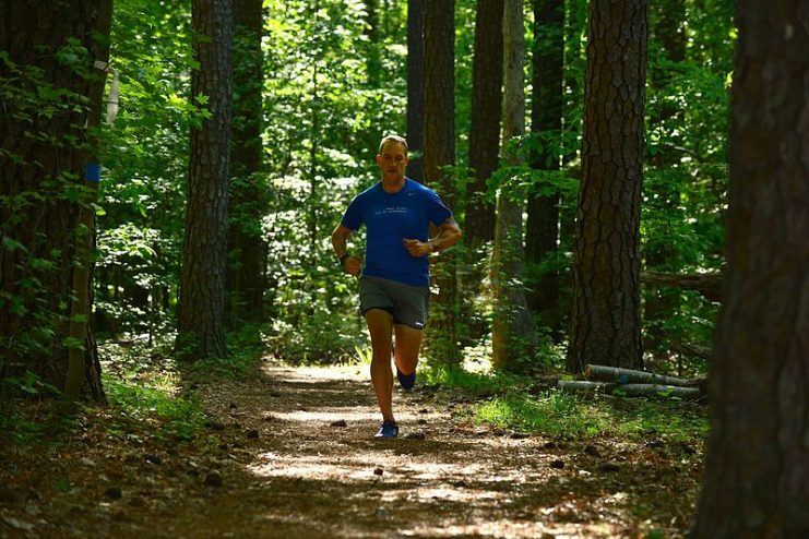 h: U.S. Army Staff Sgt. Jeffery Lewis, Charlie Company, 1st Battalion, 222nd Aviation Regiment platoon sergeant, runs through the nature trail at Fort Eustis, Va., May 12, 2015.