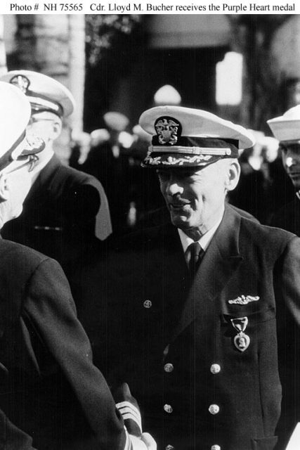Lloyd M. Bucher receiving the Purple Heart.