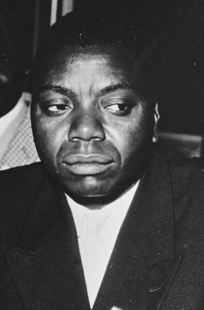 Moïse Tshombe seated at the Belgo-Congolese Round Table Conference
