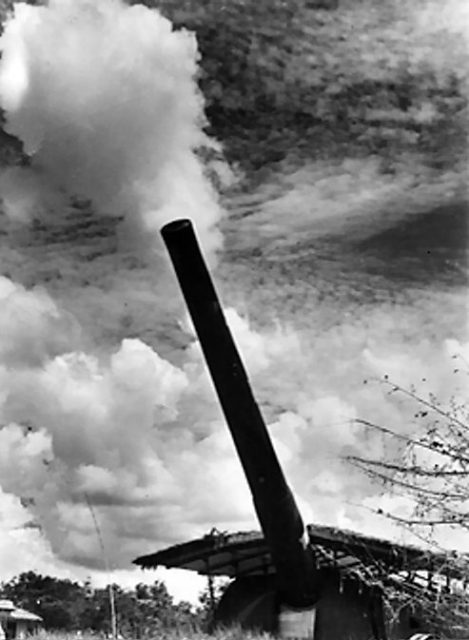 One of Singapore’s 15-inch coastal defense guns elevated for firing.8 December 1941