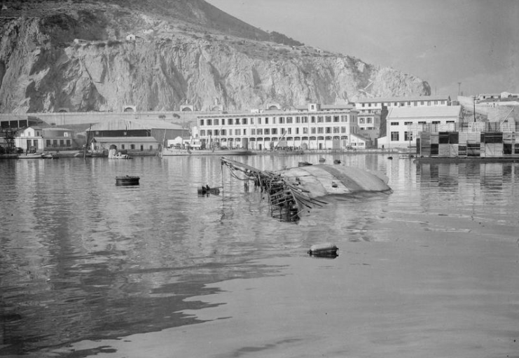 HMS Walney, Ex-American Coast Guard Cutter Lying on Its Side by the Inner Breakwater of Oran Harbour. After the Ship Had Reached Its Objective; To Break the Boom in Oran For the North African Landings, Her Commanding Officer Captain Peters Received a Posthumous VC For His Part in the Action.