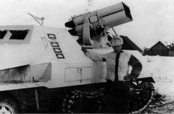 German soldier posing beside a SdKfz 4/1