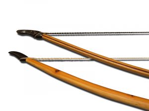 Self (bottom) and laminated (top) bows for comparison.Photo: Sémhur CC BY-SA 3.0