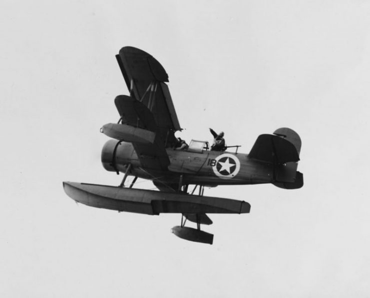 SOC Seagull drops a message as it flies over USS Augusta (CA-31), North Africa in November 1942 – Operation “Torch”