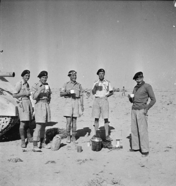 The British Army in North Africa 1942 General Montgomery enjoys a cup of coffee with the Tank Protection Troop of his Grant tank in the Western Desert, 6 November 1942.