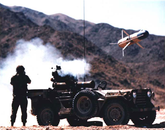 TOW missile being fired from M151A2