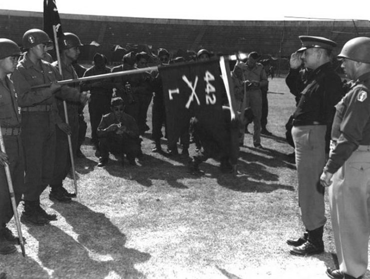 Truscott decorates Japanese American soldiers of Company ‘L’ of the 3rd Battalion, 442nd Regimental Combat Team with the Presidential Unit Citation, 4 September 1945.