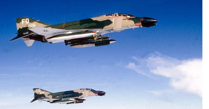 A pair of F-4C Phantoms in flight over Vietnam