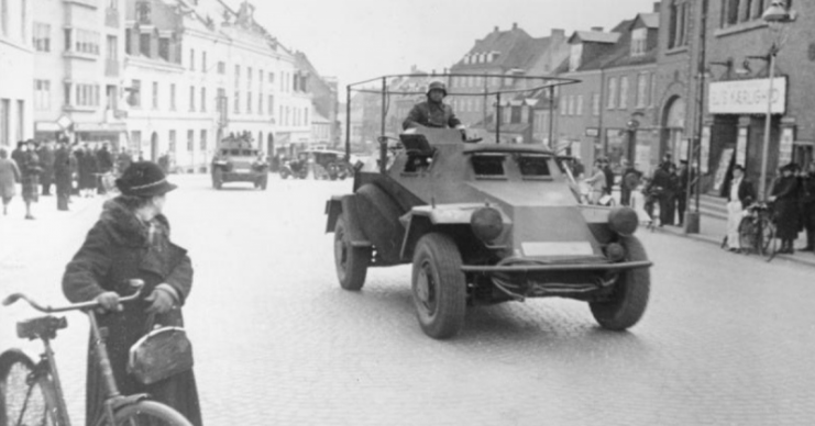 German armoured cars moving through a Danish town. By Bundesarchiv Bild CC-BY-SA 3.0