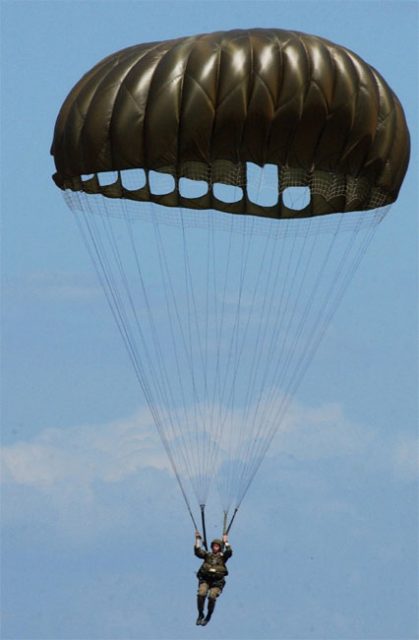 An American paratrooper using an MC1-1C series parachute.
