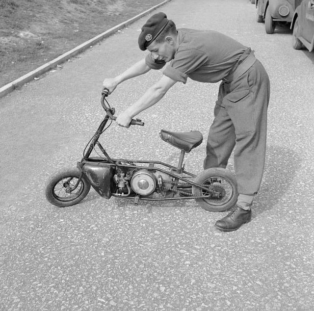 British soldier standing over a Welbike