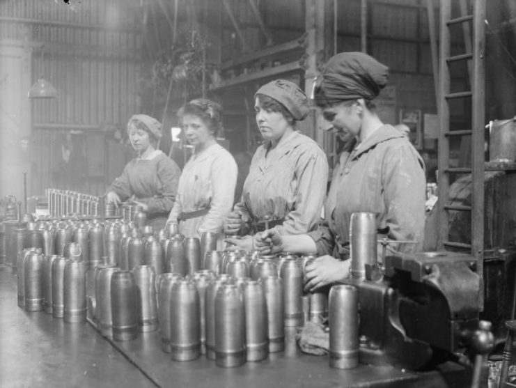 First World War: Women war workers gauge shells.