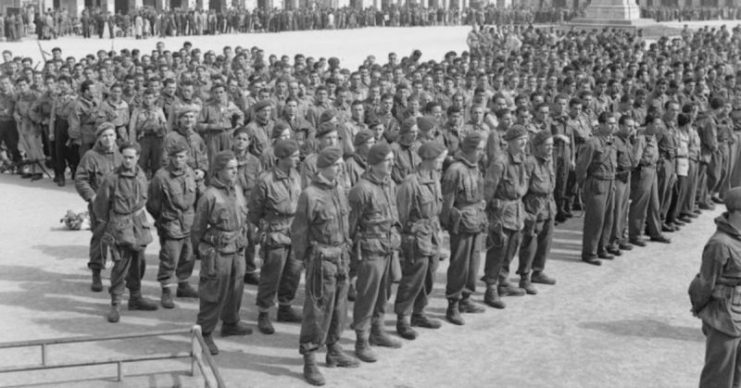 Men of 2 SAS attend an open-air mass in the Italian town of Cuneo, to celebrate the end of the war in Europe. The SAS troops had spent the previous month assisting partisans behind enemy lines.