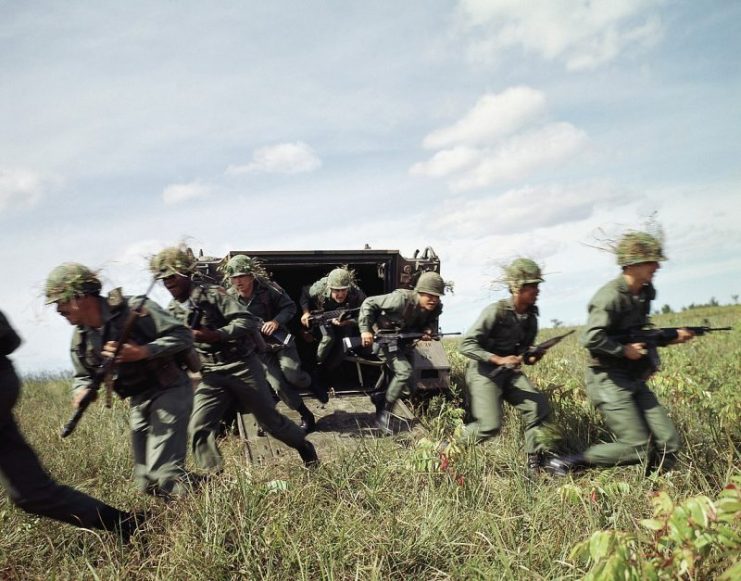 U.S. Army soldiers dismount from an M113 armored personnel carrier during a training exercise in September 1985