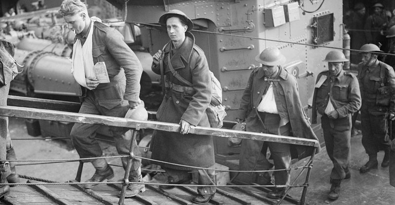 Troops evacuated from Dunkirk arrive at Dover.