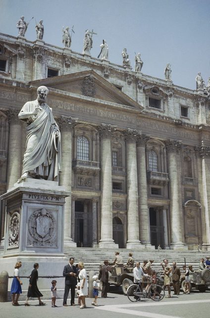 June 5, 1944: Civilians and Allied troops and vehicles outside St Peter’s Cathedral in Rome.