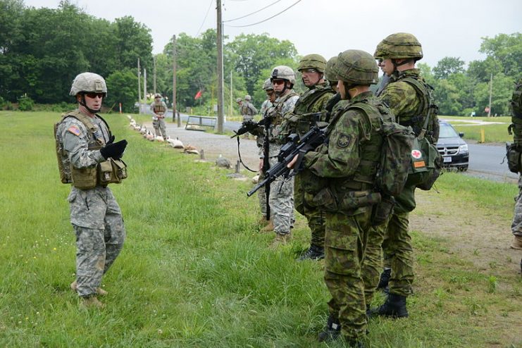 Pennsylvania National Guard soldiers from the 28th Infantry Division train on advanced rifle marksmanship techniques with Lithuanian infantrymen and women at Fort Indiantown Gap, Pa., June 10, 2014.