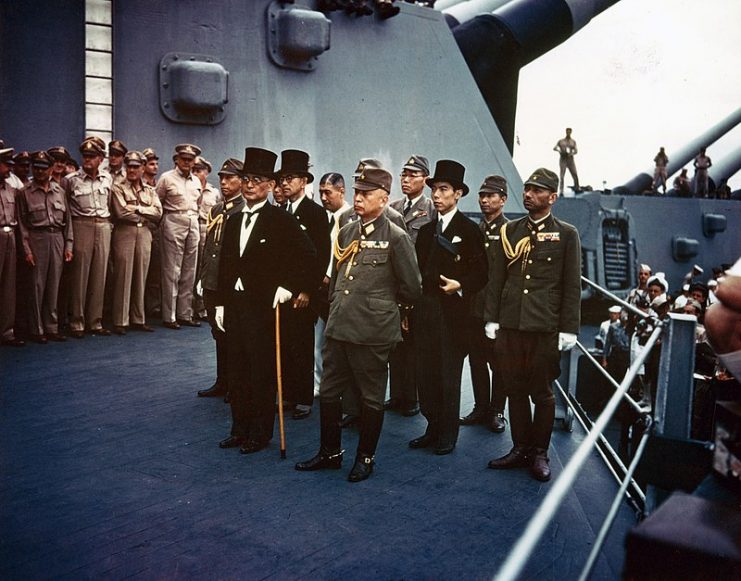 Representatives of the Empire of Japan stand aboard USS Missouri prior to signing of the Instrument of Surrender.