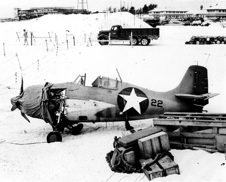 Damaged and partially disassembled F4F-3 Wildcat on Sand Island, Midway, circa 24-25 June 1942